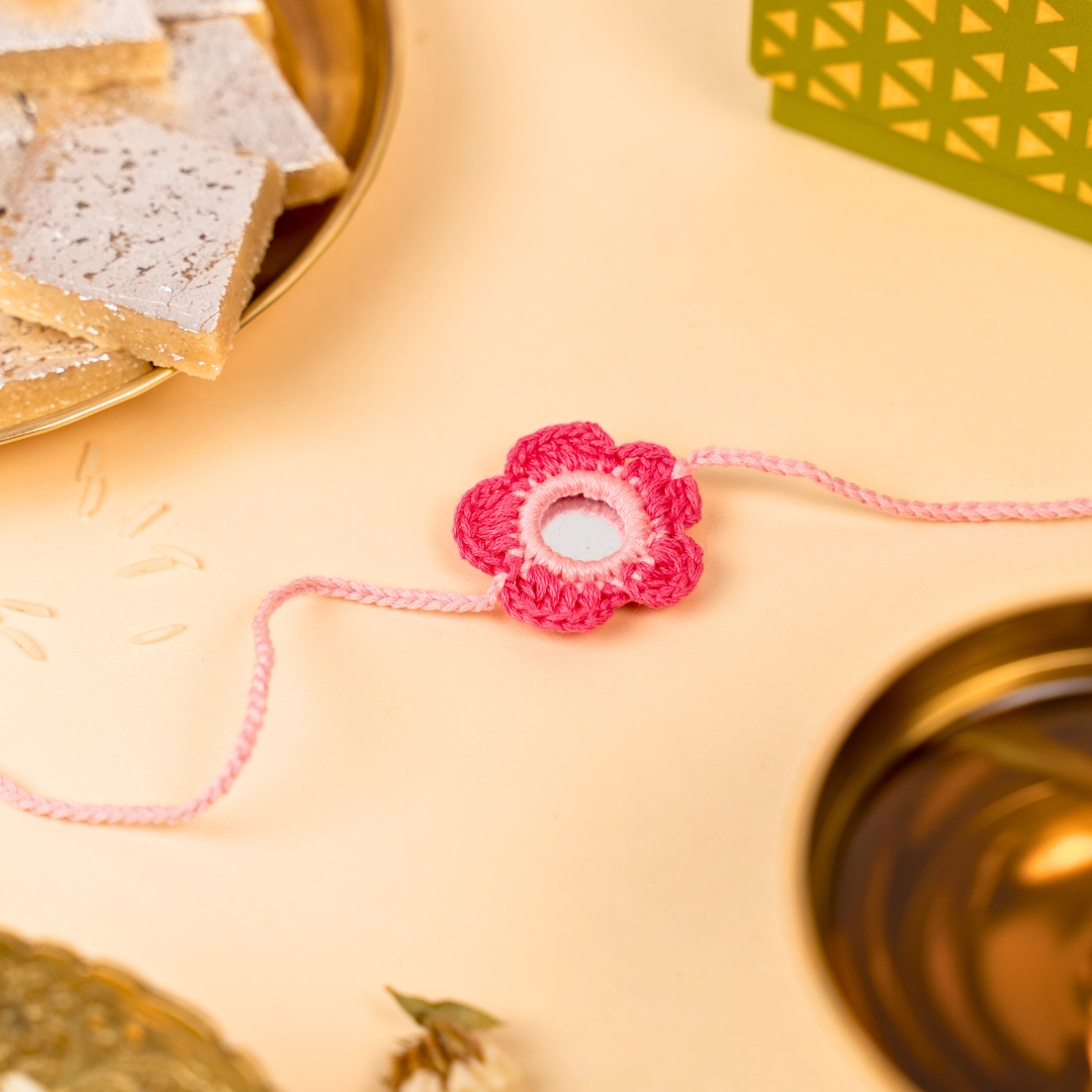 Atrangi Studio Rose Crochet Rakhi & Lumba Set