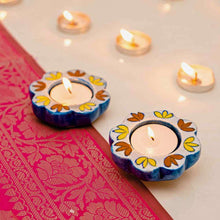 Load image into Gallery viewer, Atrangi Studio One Of All 4 Blue Pottery Candle Holders
